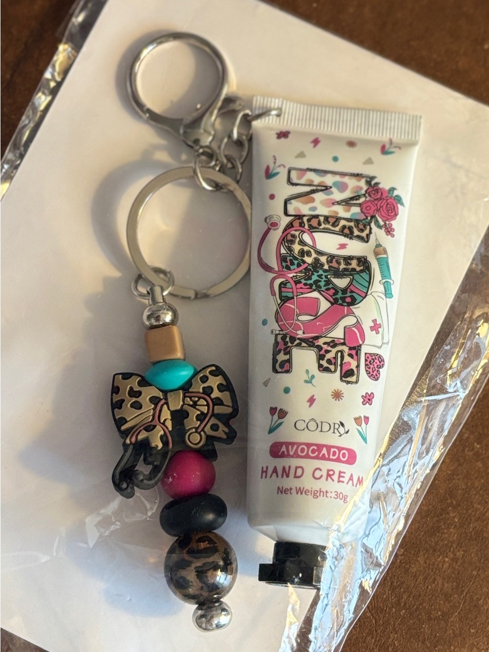 Avocado Hand Cream Keychain - White with Pink & Turquoise Accents